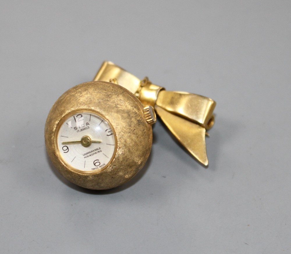 A gilt metal Sica globe manual wind fob watch, on a 9ct ribbon suspension brooch and a continental 9k fob watch.